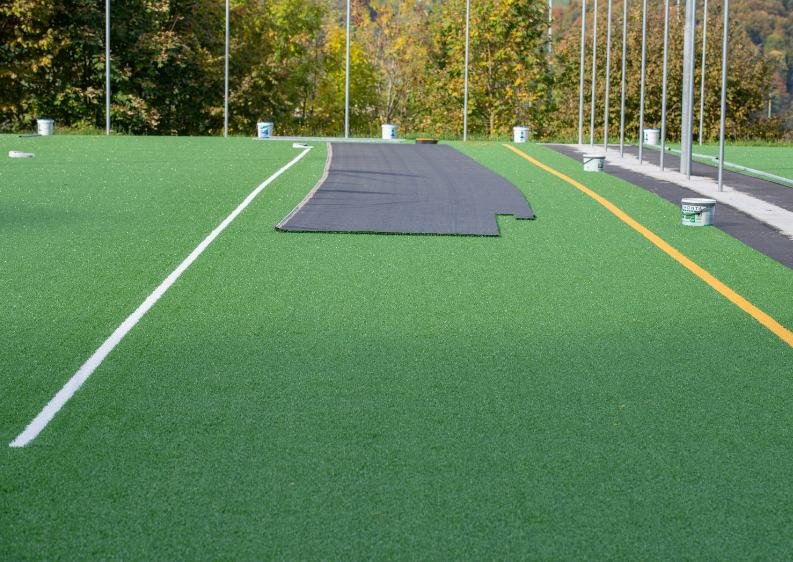 pasto sintético Alfombra en un campo deportivo